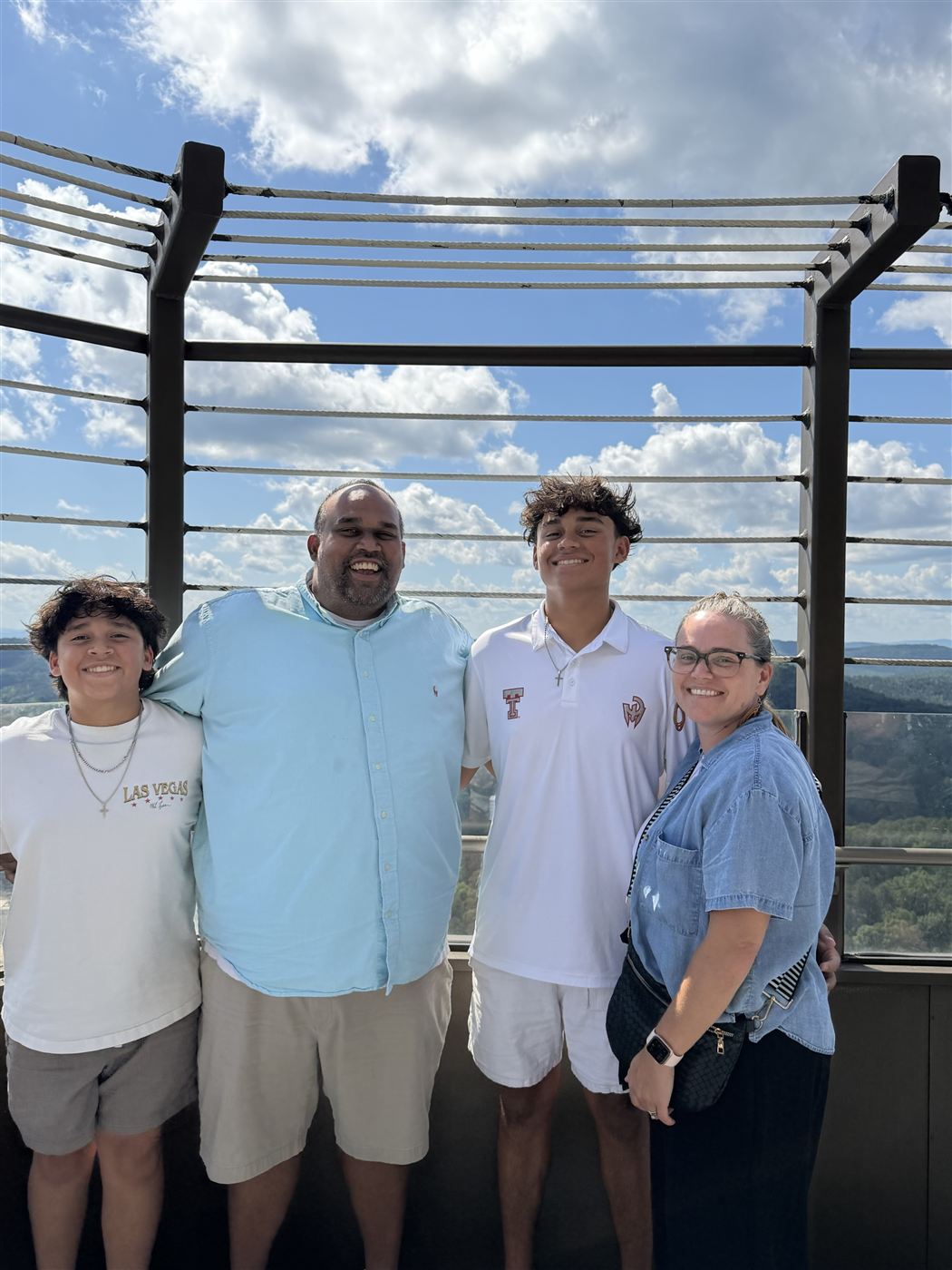 Jason Karamath with his wife and two sons
